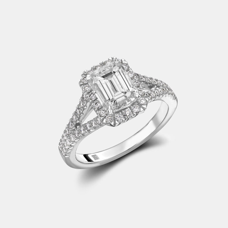 Emerald Cut Diamond Ring with Round Diamond Halo in Platinum